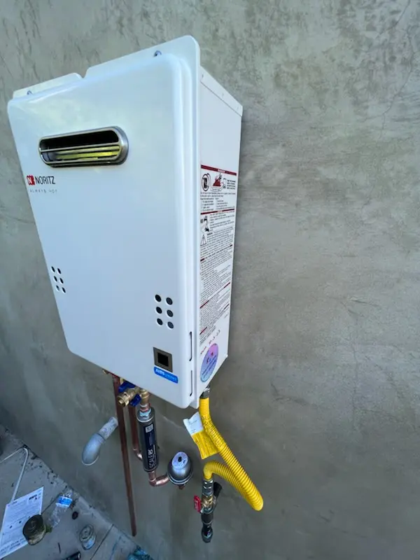 Tankless water heater installation for Bowman Manor homes